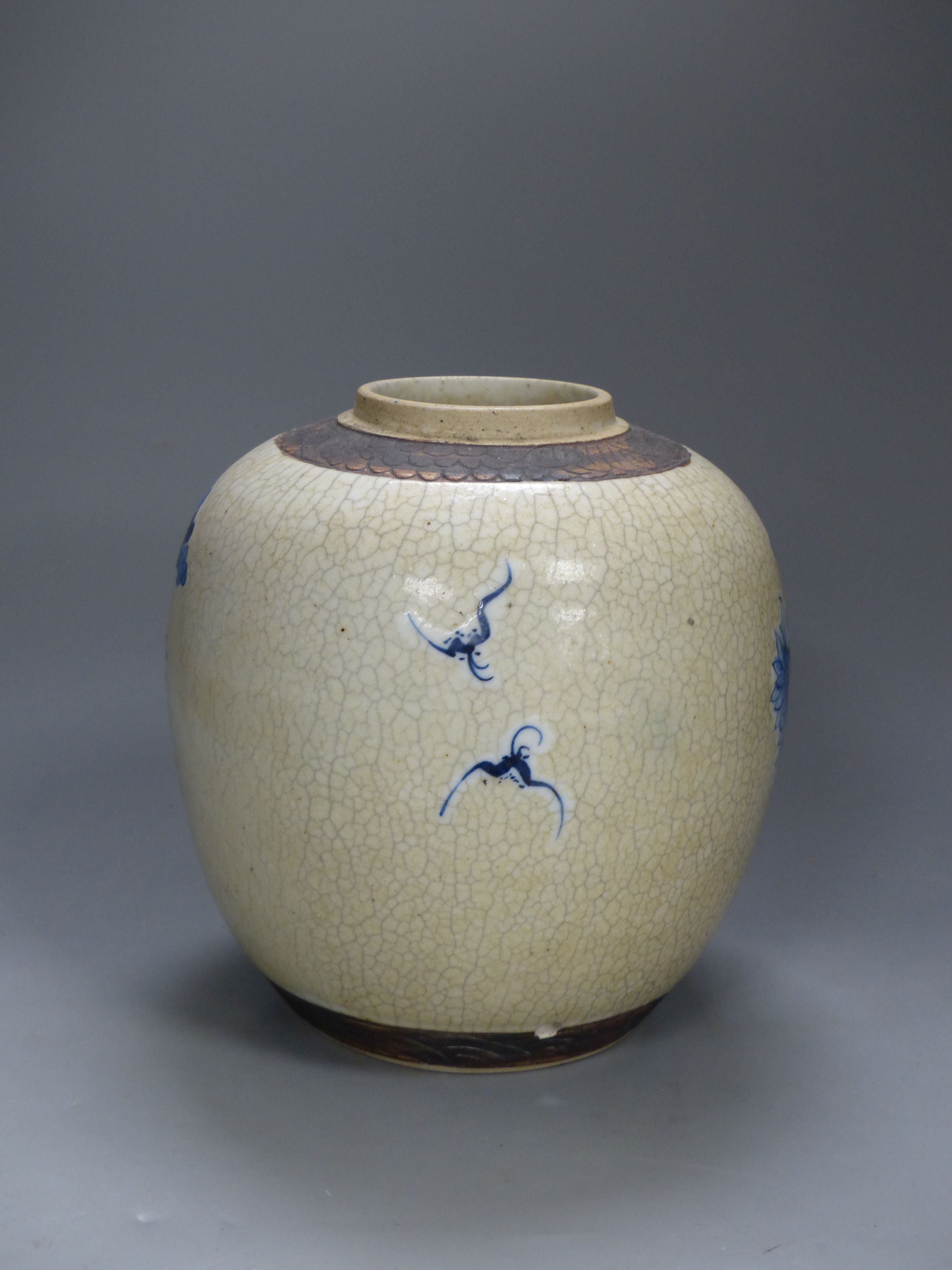 A 19th century/early 20th century Chinese blue and white crackle glaze jar, height 22cm